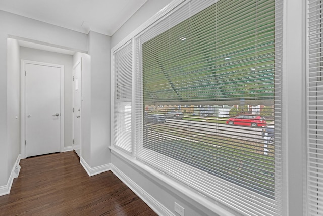 interior details featuring hardwood / wood-style flooring