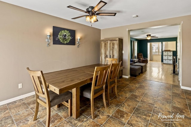 dining area with ceiling fan