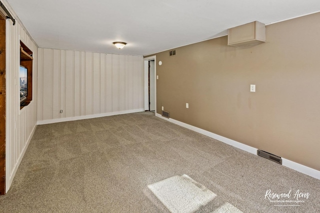 basement featuring carpet flooring