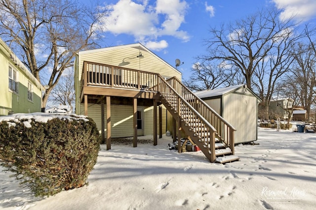 exterior space featuring a storage shed and a deck