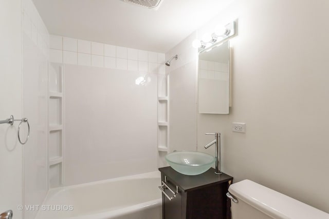 full bathroom featuring shower / tub combination, toilet, and vanity