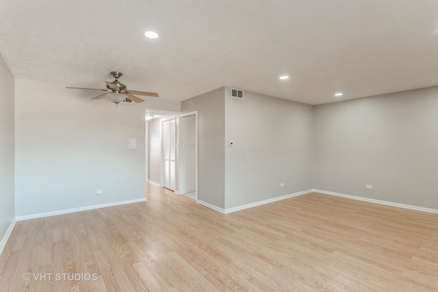 unfurnished room with ceiling fan and light hardwood / wood-style flooring