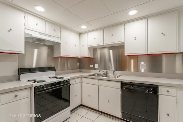 kitchen with sink, electric range, white cabinets, and dishwasher