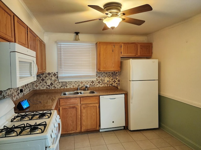 kitchen featuring white appliances, backsplash, crown molding, light tile patterned flooring, and sink