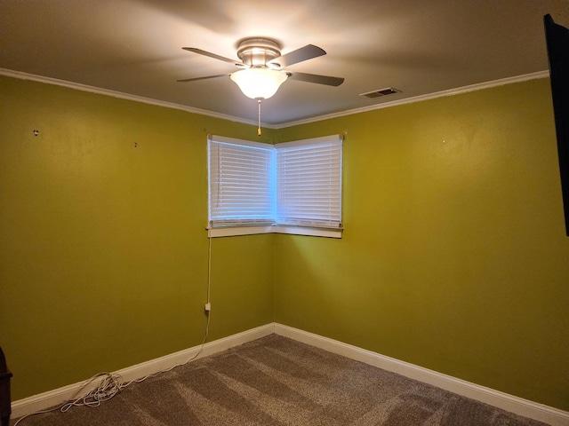 unfurnished room with ceiling fan, crown molding, and carpet flooring