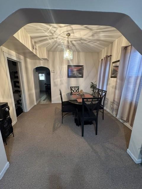 dining space featuring carpet flooring