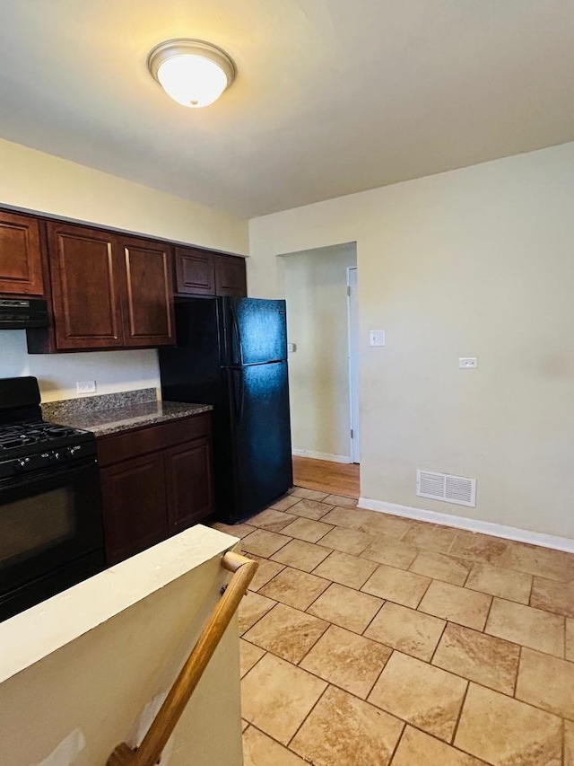 kitchen with range hood, dark brown cabinets, and black appliances