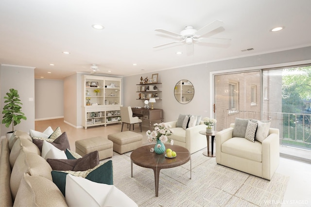 living room featuring ceiling fan and crown molding