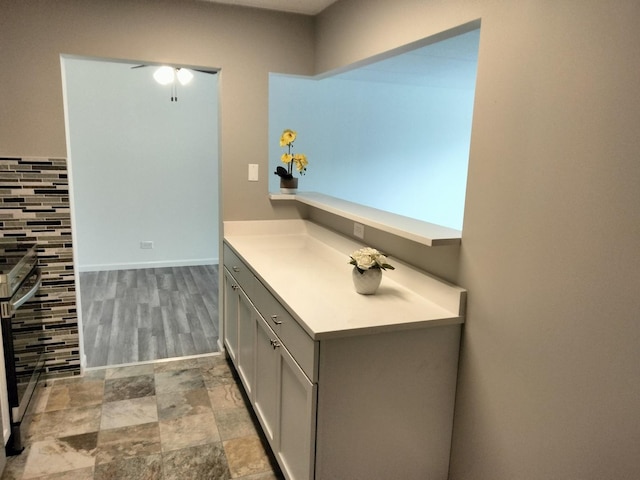 bathroom with tasteful backsplash