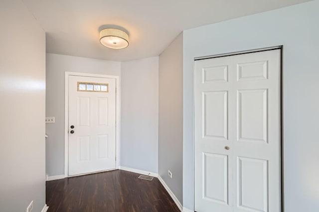 entrance foyer with dark hardwood / wood-style flooring