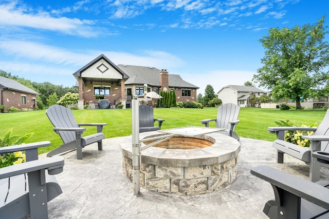 view of patio featuring a fire pit