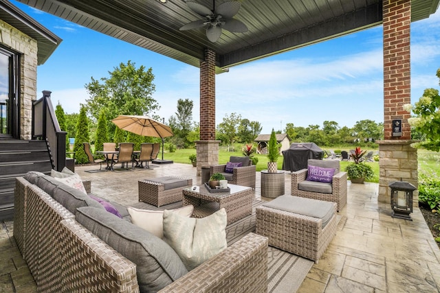 view of patio featuring ceiling fan, outdoor lounge area, and grilling area