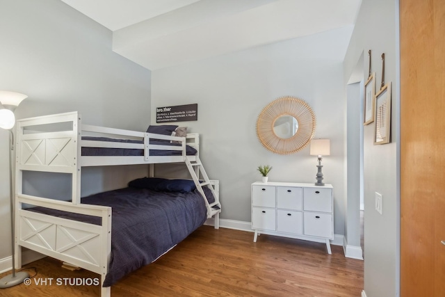 bedroom with hardwood / wood-style flooring