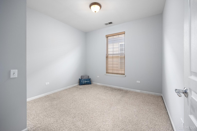 spare room with carpet flooring