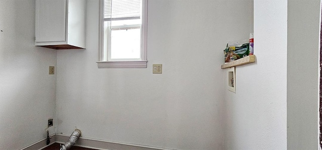 washroom with cabinets and hookup for an electric dryer