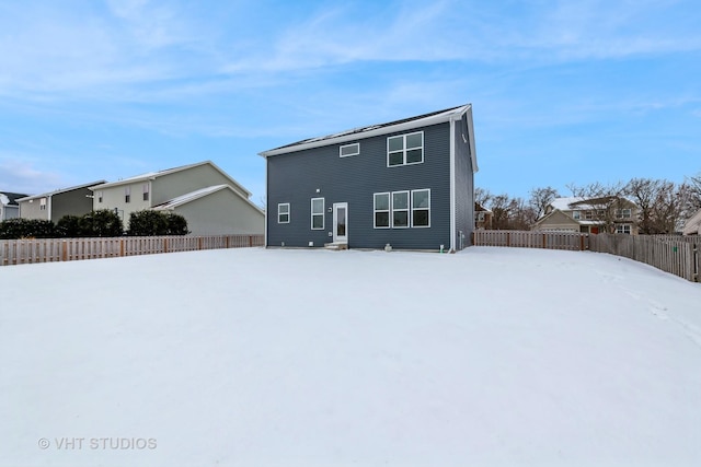 view of snow covered property