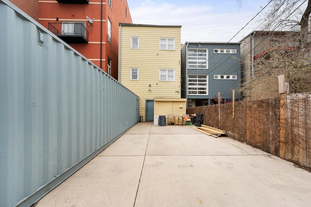 rear view of property featuring a patio area