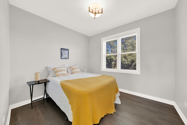 bedroom featuring dark hardwood / wood-style floors