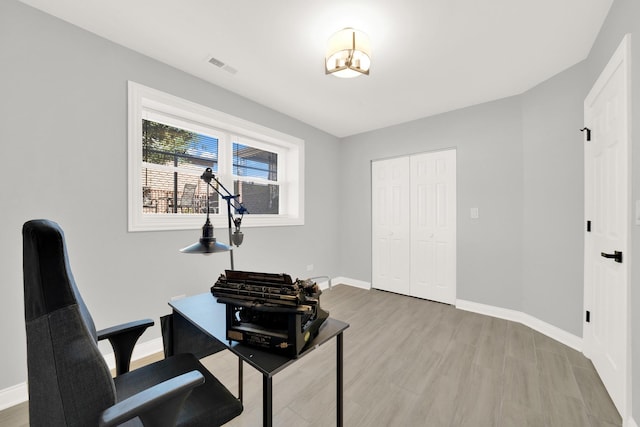 home office featuring light wood-type flooring