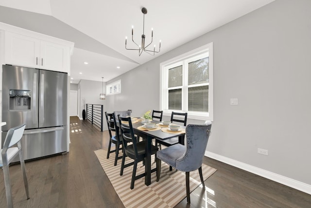 dining area with lofted ceiling and a wealth of natural light