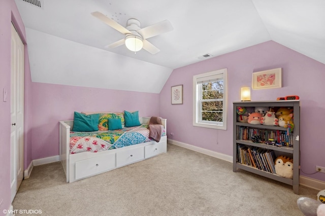 carpeted bedroom with lofted ceiling and ceiling fan