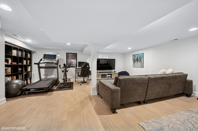 living room with light hardwood / wood-style flooring