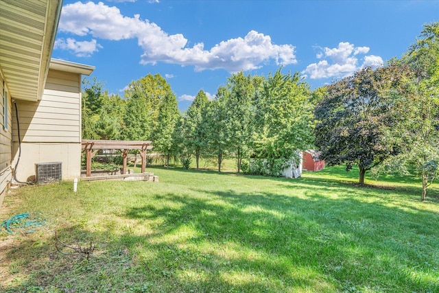 view of yard featuring central AC unit