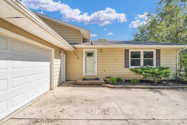 property entrance featuring a garage