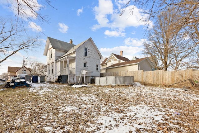 view of snow covered property