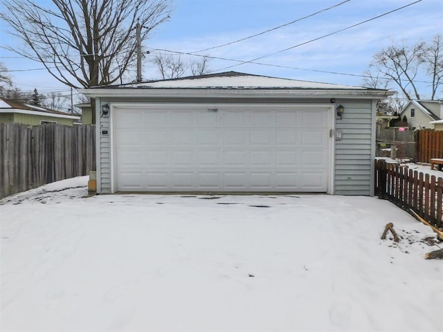 view of snow covered garage