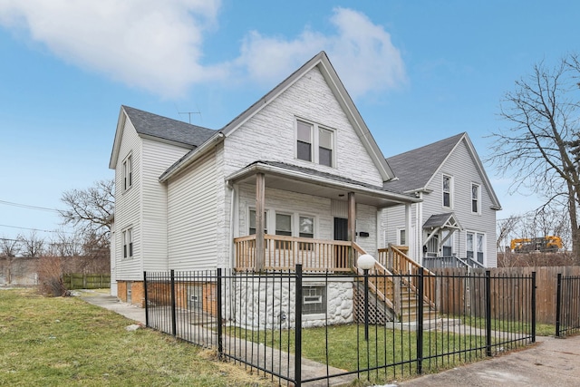 view of front of property with a front lawn and a porch