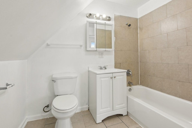 full bathroom featuring toilet, tiled shower / bath, vanity, and tile patterned floors