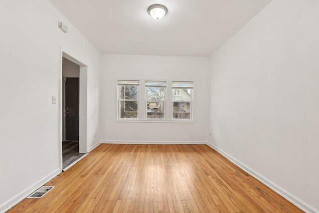 empty room featuring light hardwood / wood-style floors