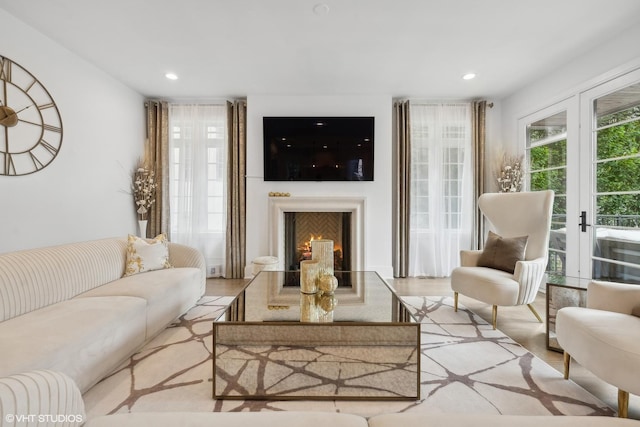 living room with light hardwood / wood-style floors