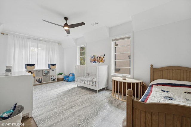 bedroom featuring ceiling fan and wood-type flooring