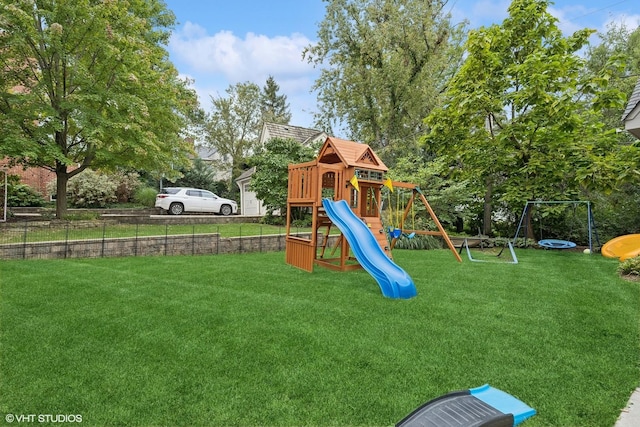 view of play area with a yard