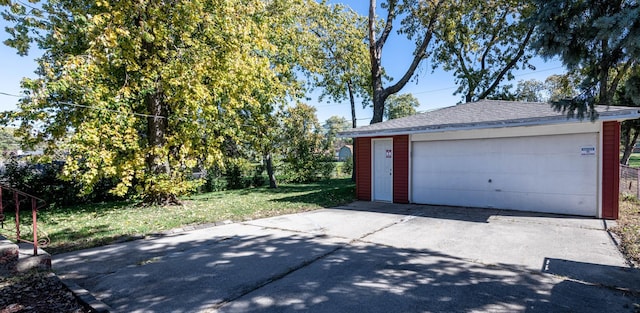 garage with a yard