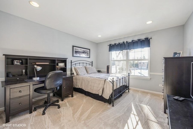 bedroom featuring light colored carpet