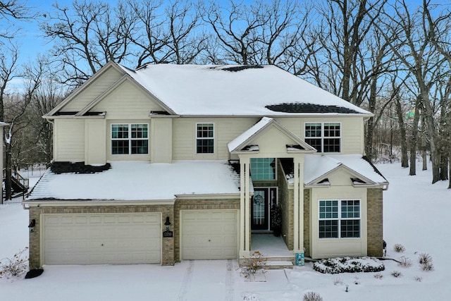 view of front of home with a garage