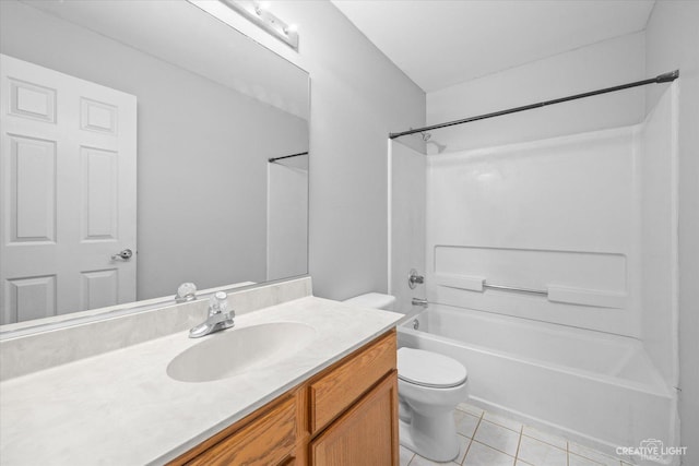 full bathroom with toilet, vanity, tile patterned floors, and shower / bath combination