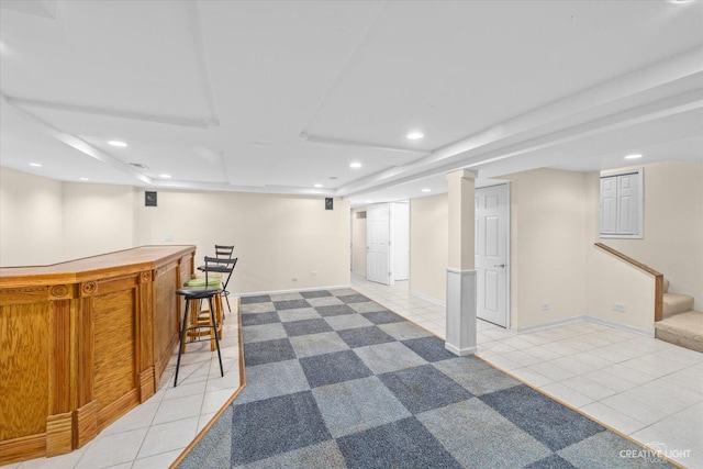 bar featuring light tile patterned floors