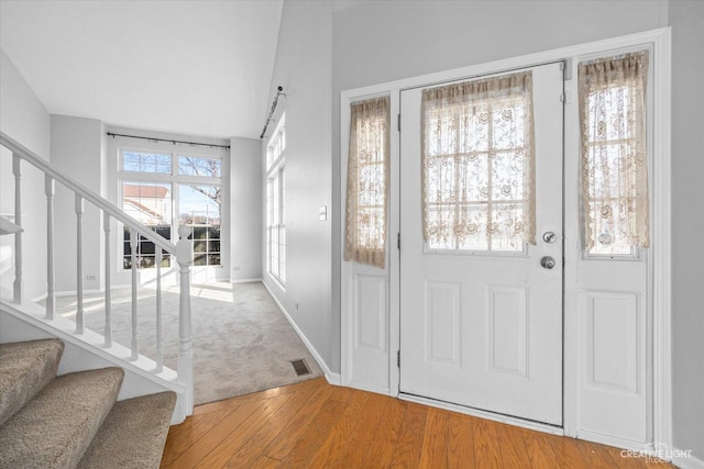 entryway with light hardwood / wood-style flooring