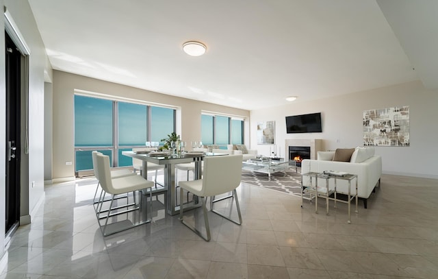 dining area with light tile patterned floors