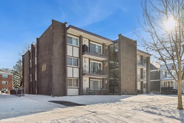 view of snow covered property