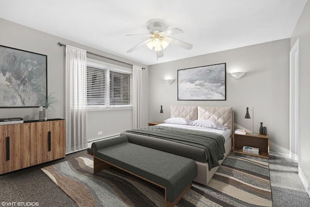 bedroom with ceiling fan, a baseboard radiator, and dark carpet