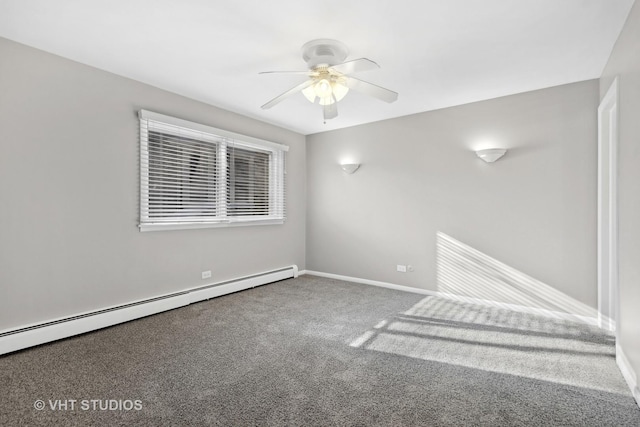 empty room with carpet floors, baseboard heating, and ceiling fan