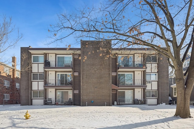 view of snow covered property