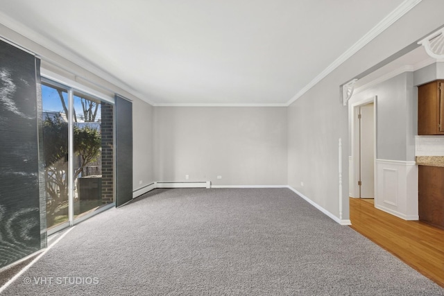 carpeted spare room with crown molding and a baseboard radiator