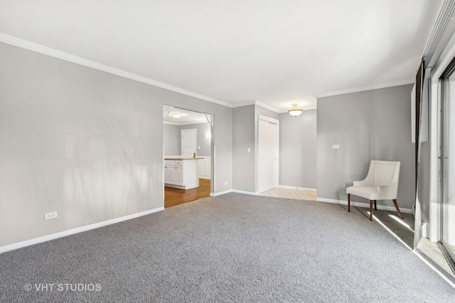 unfurnished room with carpet and crown molding