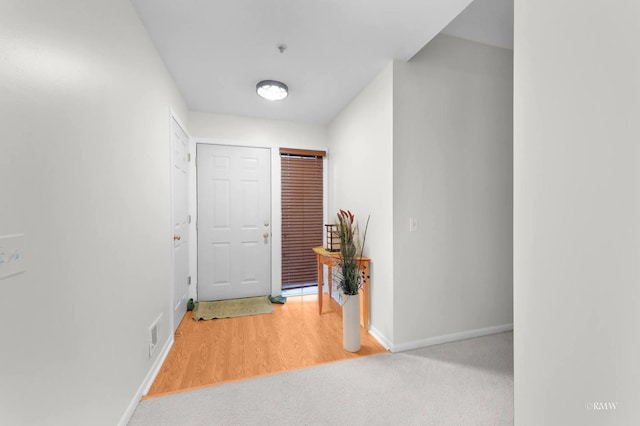 hallway featuring hardwood / wood-style floors